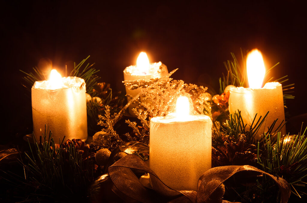Four Burning Candle In Advent Wreath